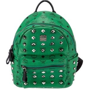 IN SEARCH OF: MCM studded backpack in green, size medium.